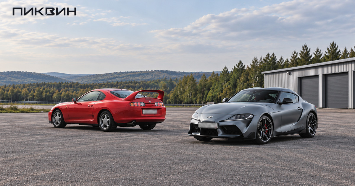 Красная Toyota Supra A80 и серая GR Supra стоят отдельно на широкой асфальтовой площадке.