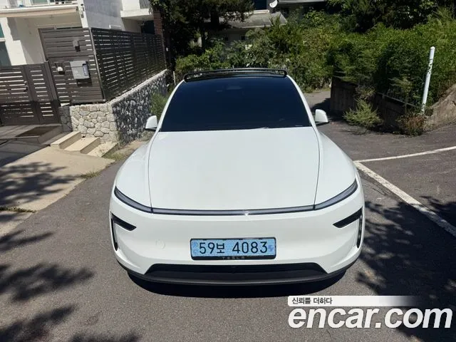 Tesla Model Y — Фото автомобиля 3