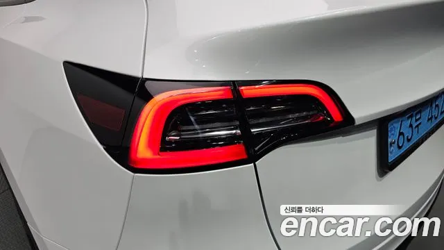 Tesla Model Y — Фото автомобиля 7