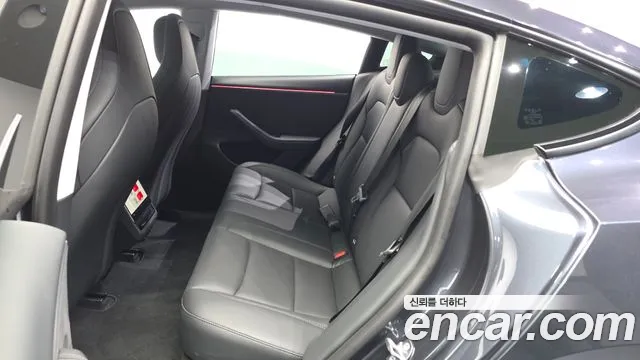 Tesla Model 3 — Фото автомобиля 15