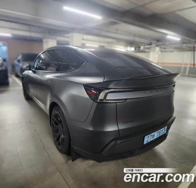 Tesla Model Y — Фото автомобиля 5