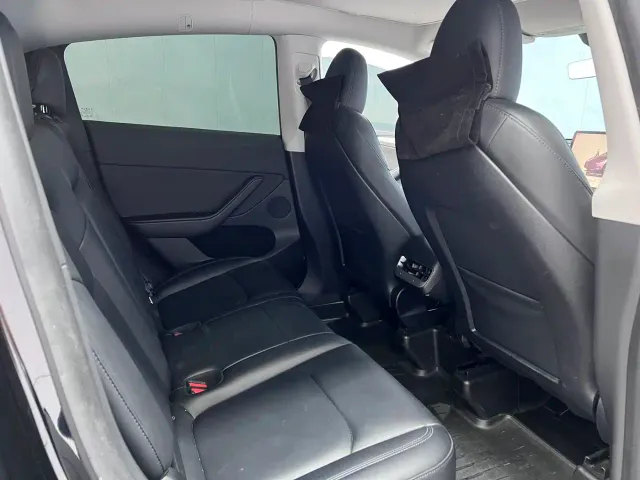 Tesla Model Y — Фото автомобиля 11
