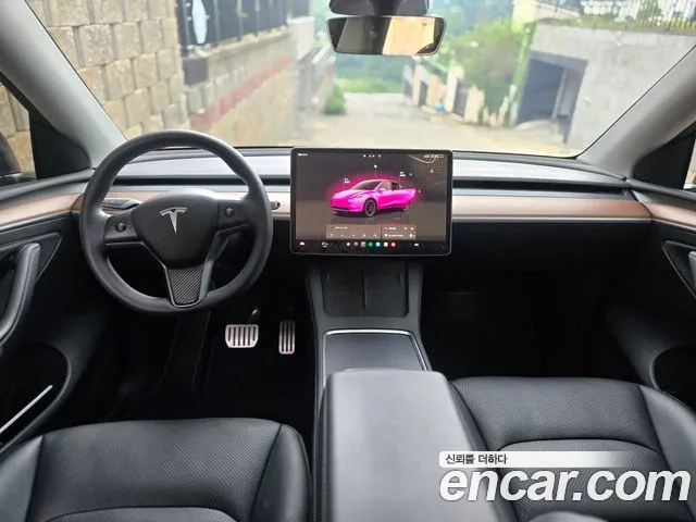 Tesla Model Y — Фото автомобиля 6