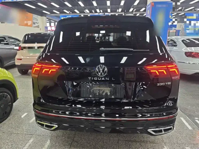 Volkswagen Tiguan L — Фото автомобиля 5