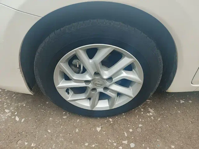Nissan Tiida — Фото автомобиля 22