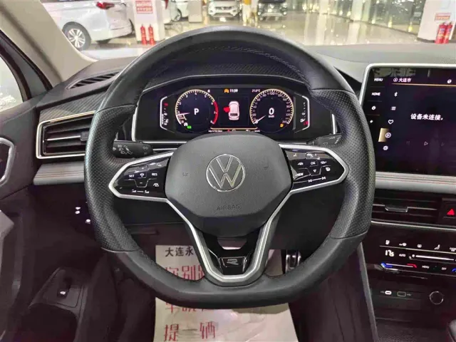 Volkswagen Tiguan L — Фото автомобиля 8