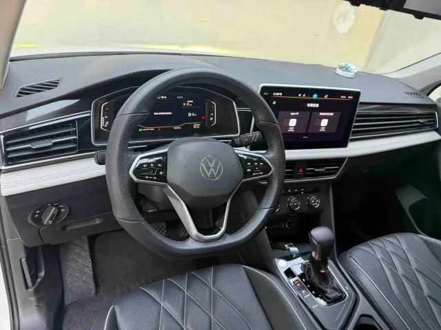 Volkswagen Tiguan L — Фото автомобиля 7
