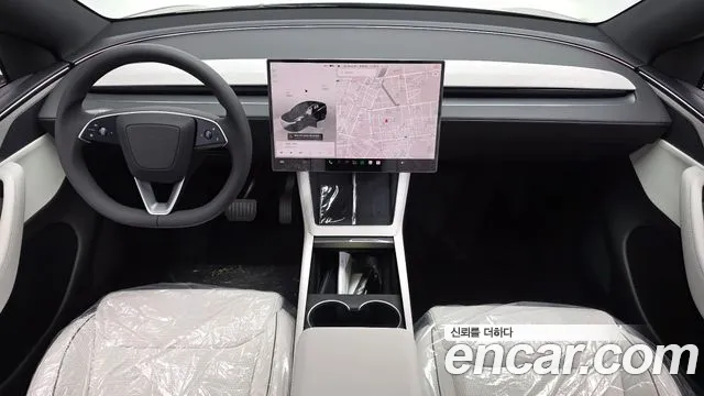 Tesla Model Y — Фото автомобиля 7
