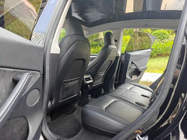 Tesla Model Y — Фото автомобиля 14