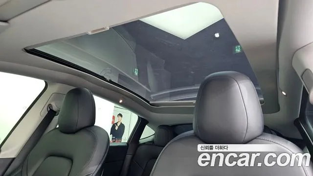 Tesla Model Y — Фото автомобиля 15