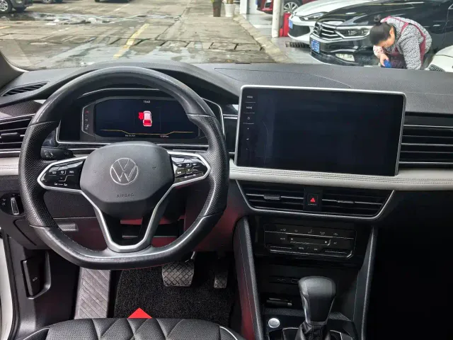 Volkswagen Tiguan L — Фото автомобиля 9