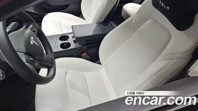 Tesla Model 3 — Фото автомобиля 28