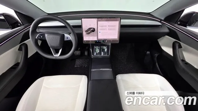 Tesla Model Y — Фото автомобиля 10