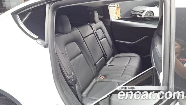 Tesla Model Y — Фото автомобиля 26