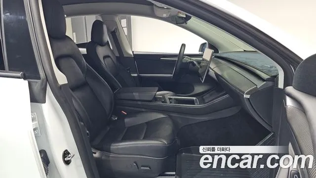 Tesla Model Y — Фото автомобиля 25