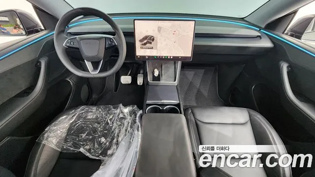 Tesla Model Y — Фото автомобиля 6