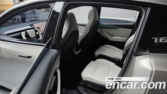 Tesla Model Y — Фото автомобиля 27