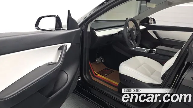 Tesla Model Y — Фото автомобиля 10