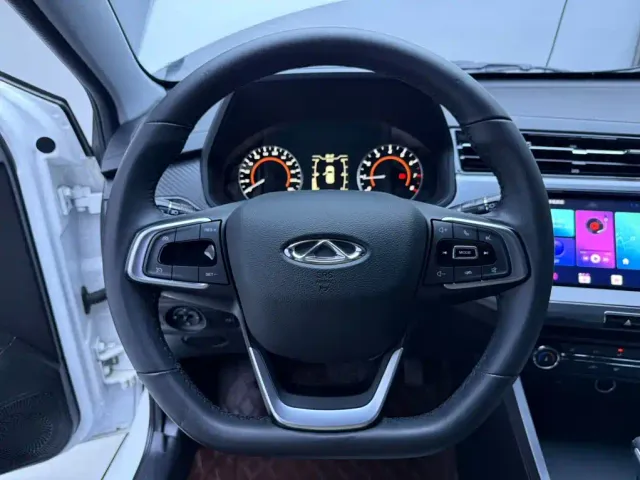 Chery Tiggo 3x — Фото автомобиля 11