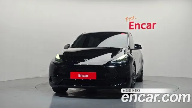 Tesla Model Y — Фото автомобиля 3