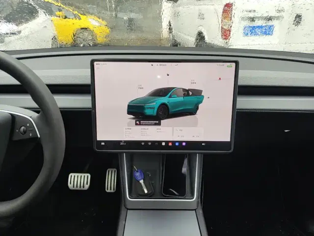 Tesla Model Y — Фото автомобиля 12