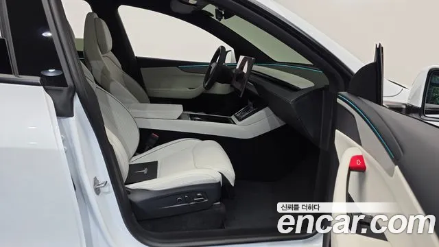 Tesla Model Y — Фото автомобиля 11