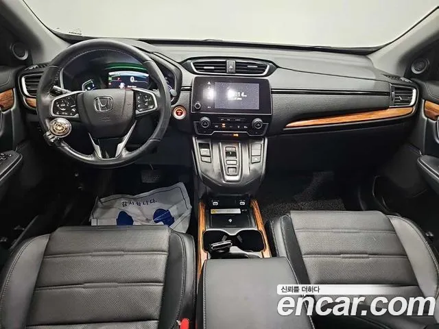 Honda CR-V CR-V 5-е поколение 2.0 гибрид Touring 4WD — Фото автомобиля 7