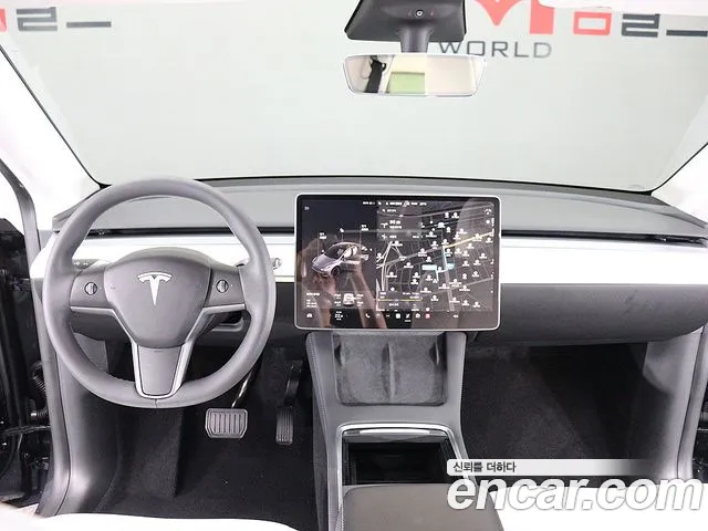 Tesla Model Y — Фото автомобиля 7