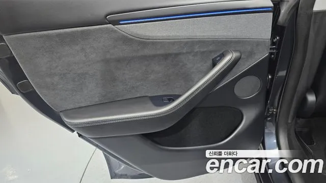 Tesla Model Y — Фото автомобиля 14