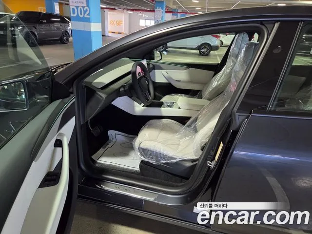 Tesla Model Y — Фото автомобиля 6