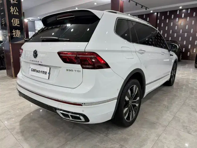 Volkswagen Tiguan L — Фото автомобиля 4