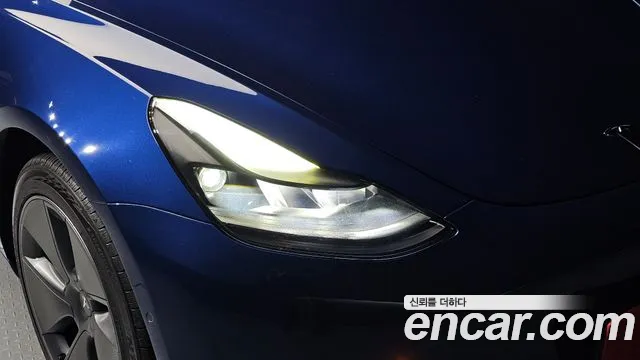 Tesla Model 3 — Фото автомобиля 7