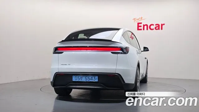 Tesla Model Y — Фото автомобиля 4