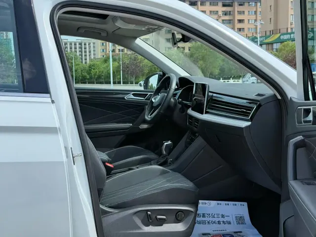 Volkswagen Tiguan L — Фото автомобиля 4