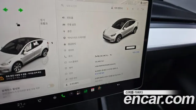 Tesla Model Y — Фото автомобиля 11