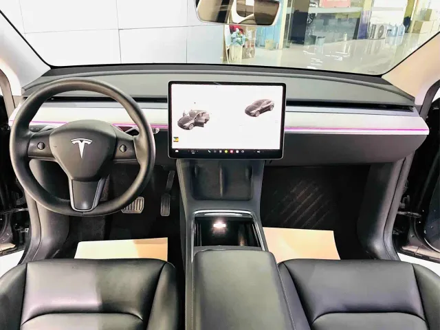 Tesla Model Y — Фото автомобиля 9