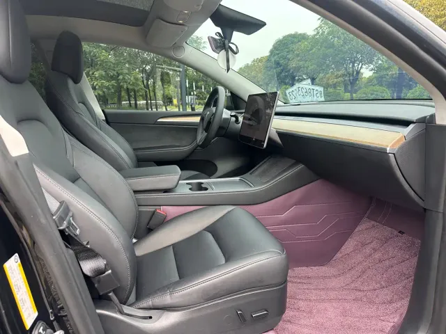 Tesla Model Y — Фото автомобиля 13