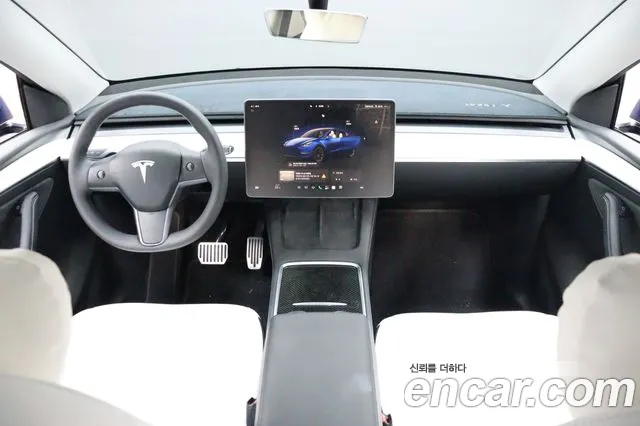 Tesla Model Y — Фото автомобиля 7
