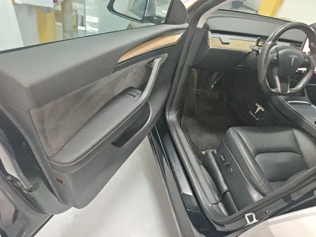 Tesla Model Y — Фото автомобиля 15