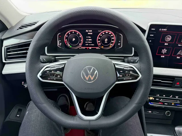 Volkswagen Tiguan L — Фото автомобиля 10
