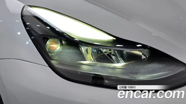 Tesla Model Y — Фото автомобиля 7
