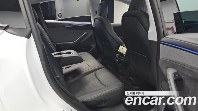 Tesla Model Y — Фото автомобиля 7