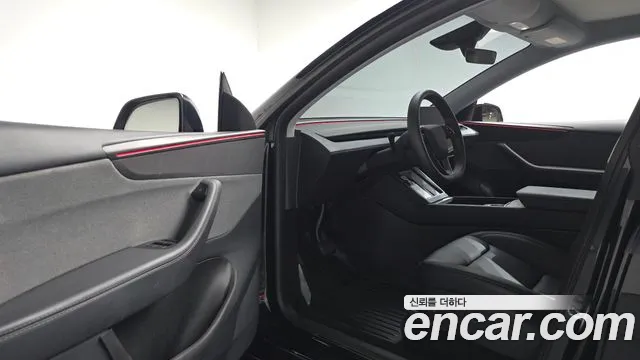 Tesla Model Y — Фото автомобиля 15