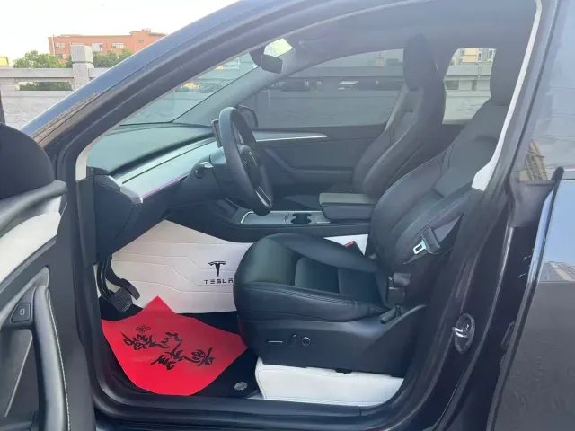 Tesla Model Y — Фото автомобиля 5