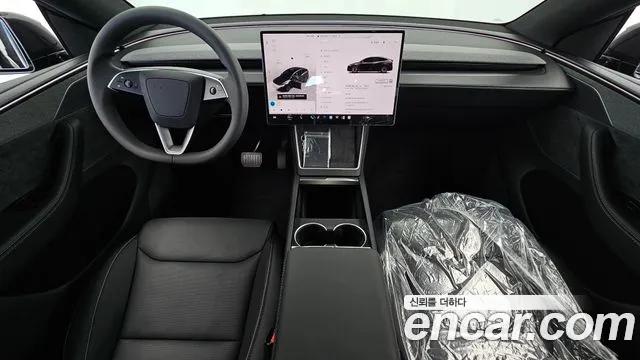 Tesla Model Y — Фото автомобиля 7