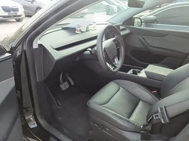Tesla Model Y — Фото автомобиля 15