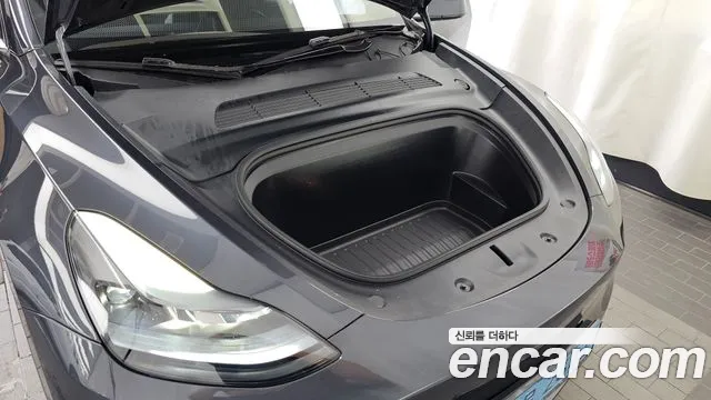 Tesla Model Y — Фото автомобиля 6