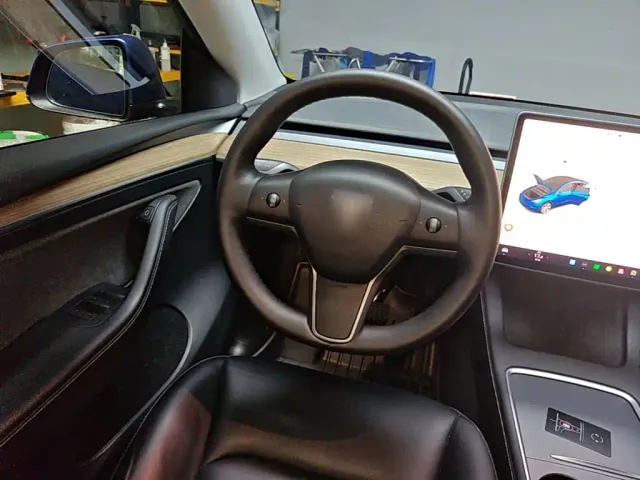 Tesla Model Y — Фото автомобиля 10