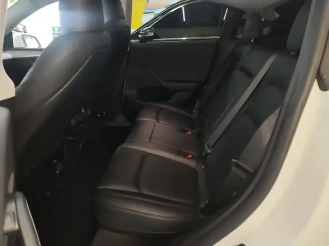 Tesla Model Y — Фото автомобиля 16