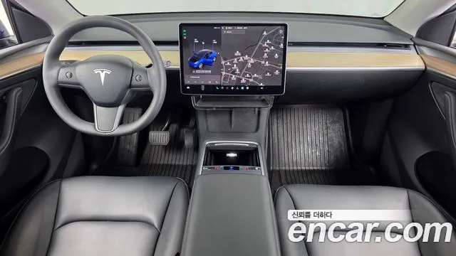 Tesla Model Y — Фото автомобиля 10